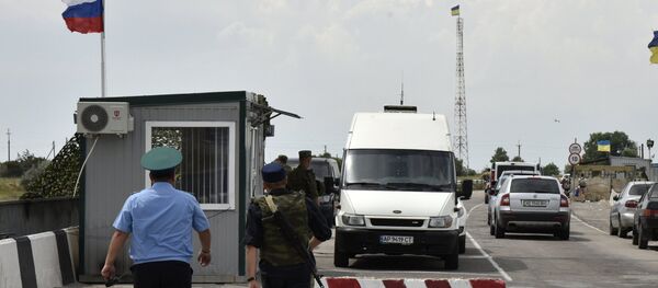 Ponto de passagem na fronteira russo-ucraniana (foto do arquivo) - Sputnik Brasil