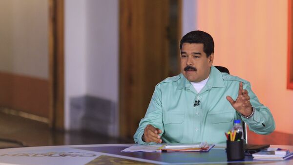 Nicolás Maduro durante seu pronunciamento semanal En contacto con Maduro em Caracas - Sputnik Brasil