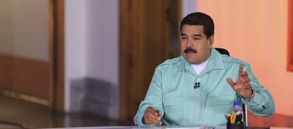 Nicolás Maduro durante seu pronunciamento semanal En contacto con Maduro em Caracas - Sputnik Brasil
