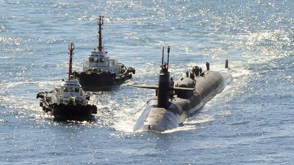 Submarino nuclear USS Michigan se aproxima da base naval em Busan, Coreia do Sul, em meio a provocações nucleares por parte da Coreia do Norte - Sputnik Brasil