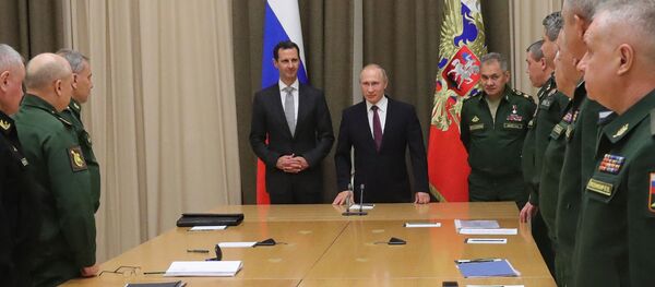 Vladimir Putin meets with Syrian President Bashar Al-Assad - Sputnik Brasil